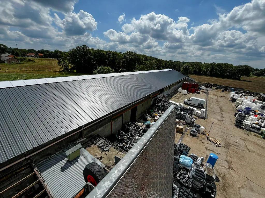Newly fitted roof after asbestos removal including skylight (rear)